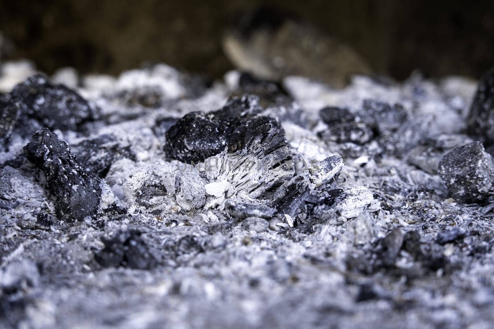 Detail of charcoal burned to grill food on a grill, party and celebration