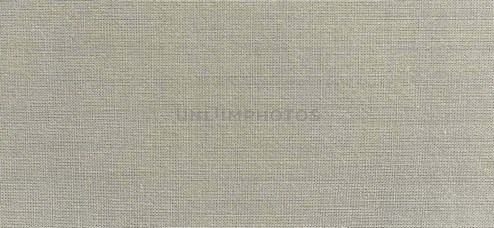 gray background of intertwined threads and rows. Banner. Fabric texture with uneven surface.