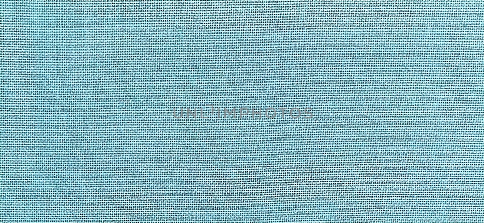 blue-green background of intertwined threads and rows. Banner. Fabric texture with uneven surface.