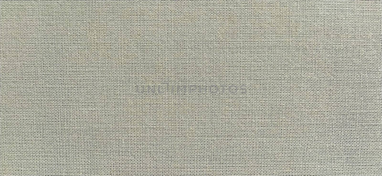 gray background of intertwined threads and rows. Banner. Fabric texture with uneven surface.