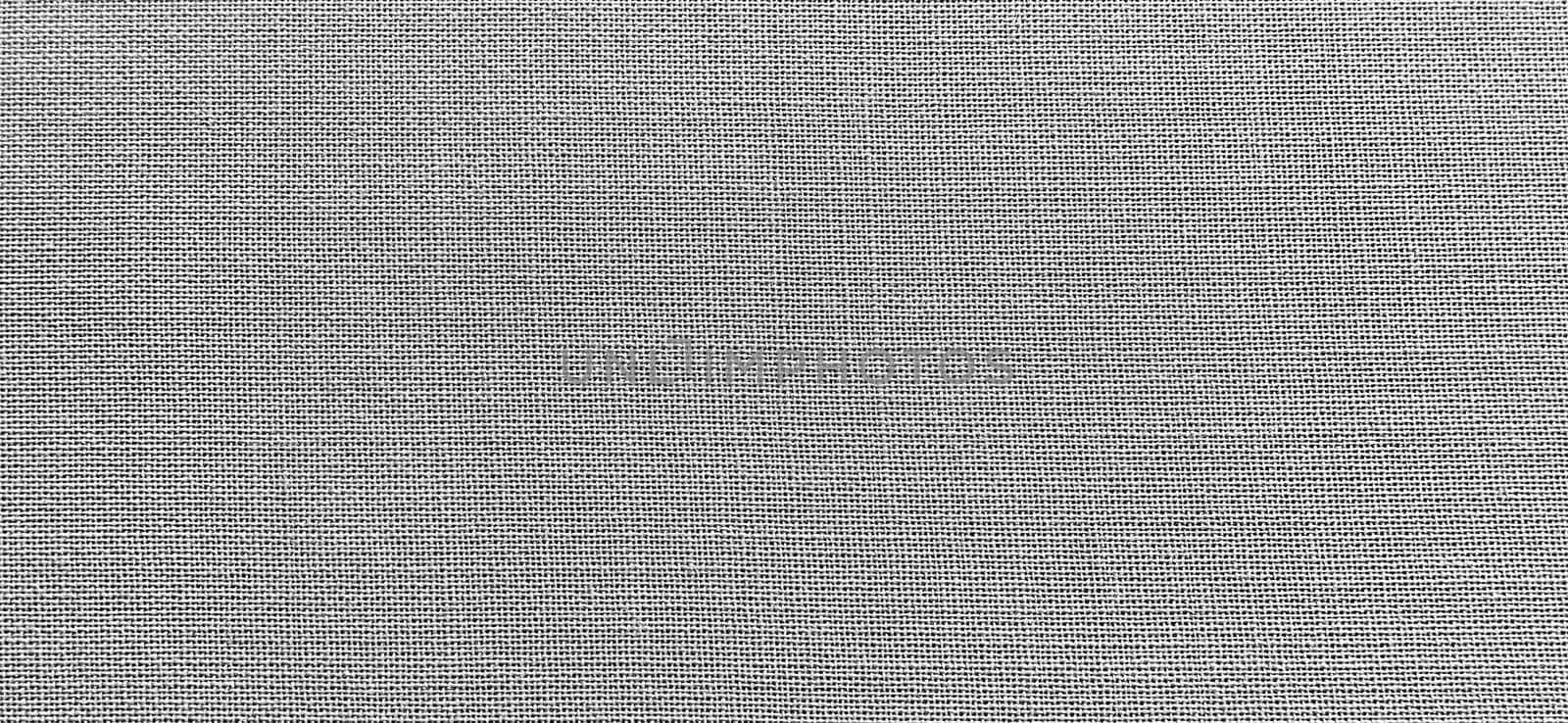 gray background of intertwined threads and rows. Banner. Fabric texture with uneven surface.