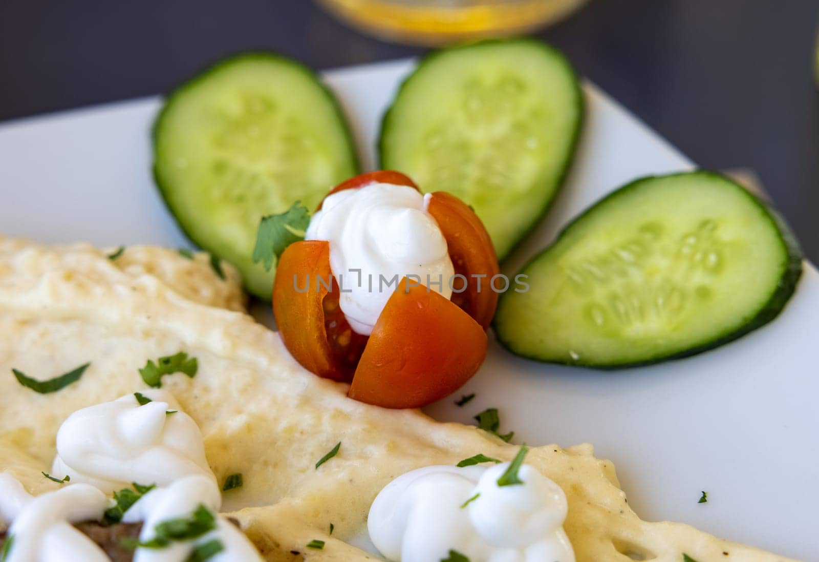 Healthy vegetable appetizer with cucumbers and tomato