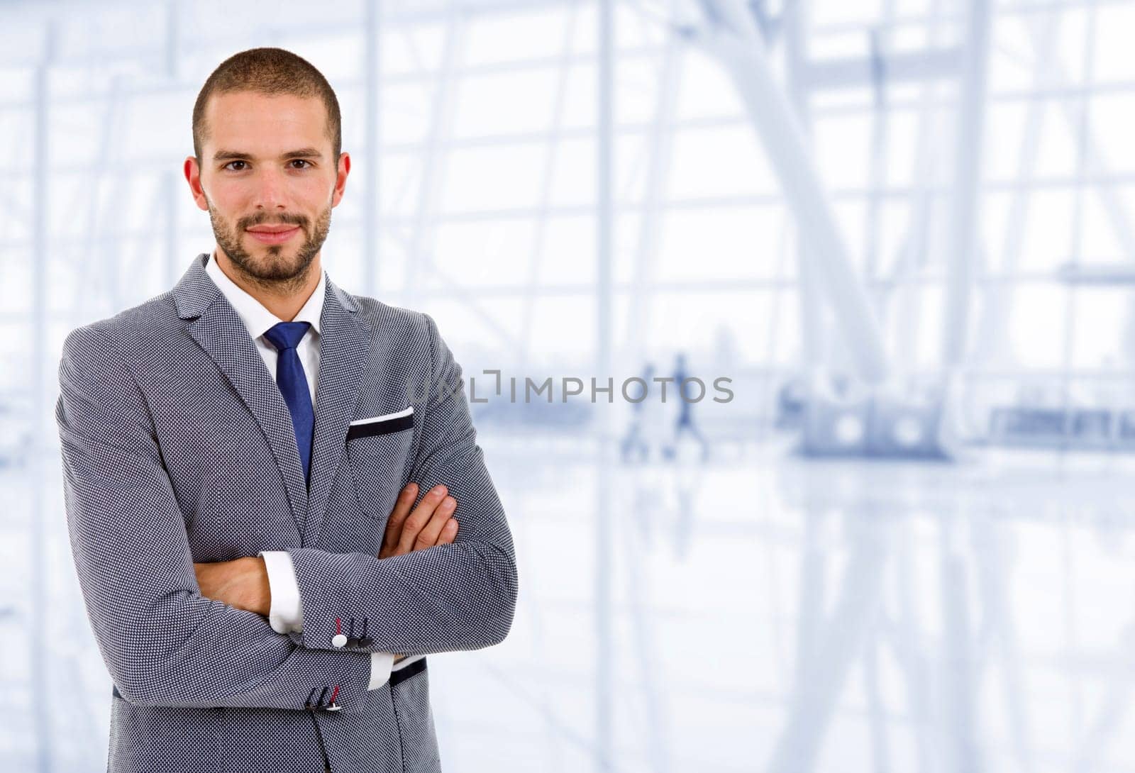 young business man portrait at the office