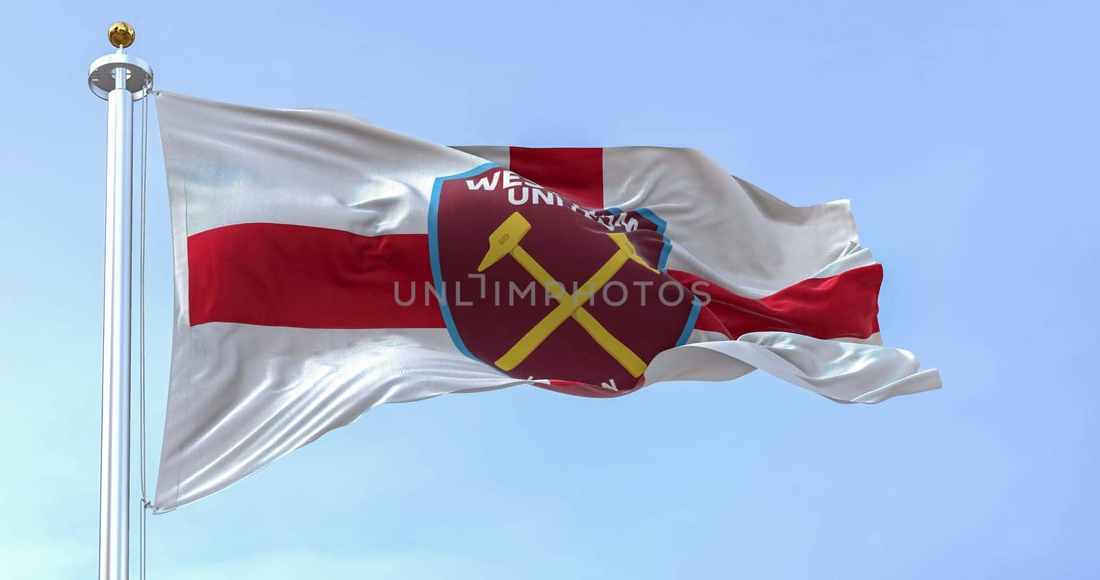 London, UK, Oct. 2022: West Ham United F.C. flag waving in the wind on a clear day. West Ham United F.C is an English football club based in London. Illustrative editorial 3d illustration render