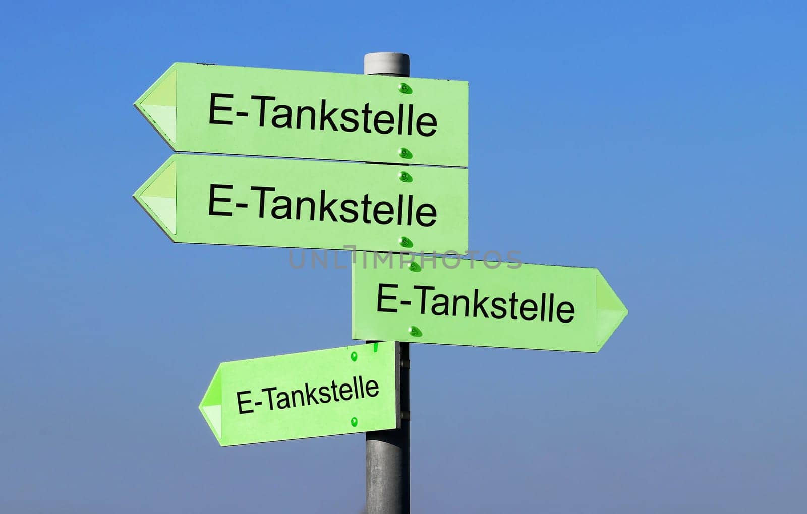 E-filling stations notice signs. Signs with here go to e-filling stations