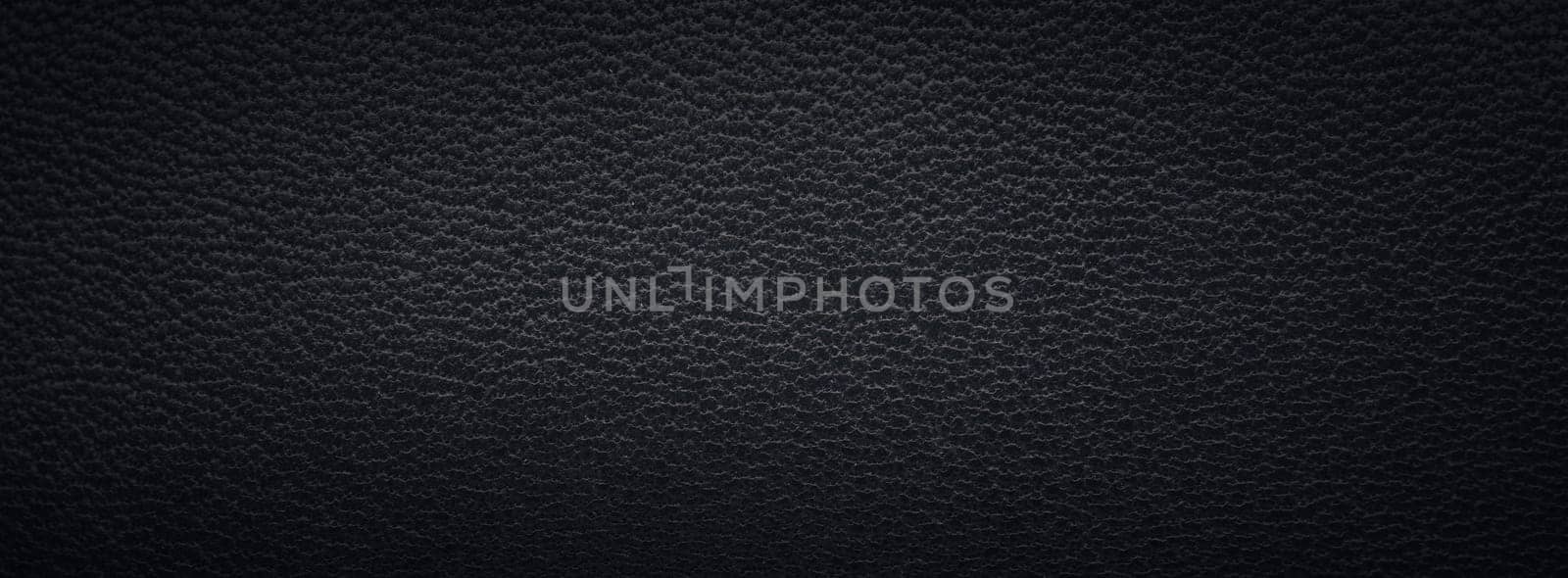 Beautiful texture of a fine black leather surface using as background or header