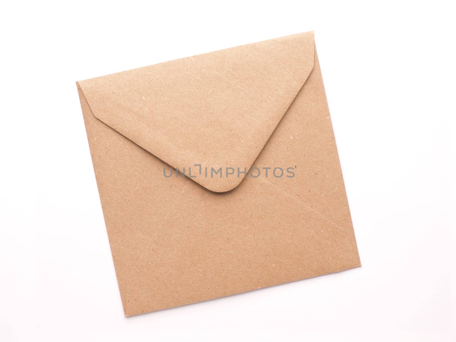 Brown eco friendly envelope, recycled paper, environmental protection, writing concept
