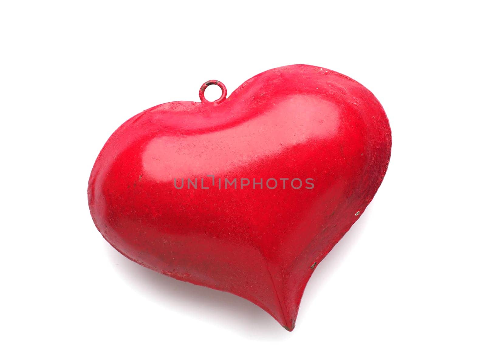 Red metal heart shape, love symbol, close up studio shot, Valentines Day or wedding object