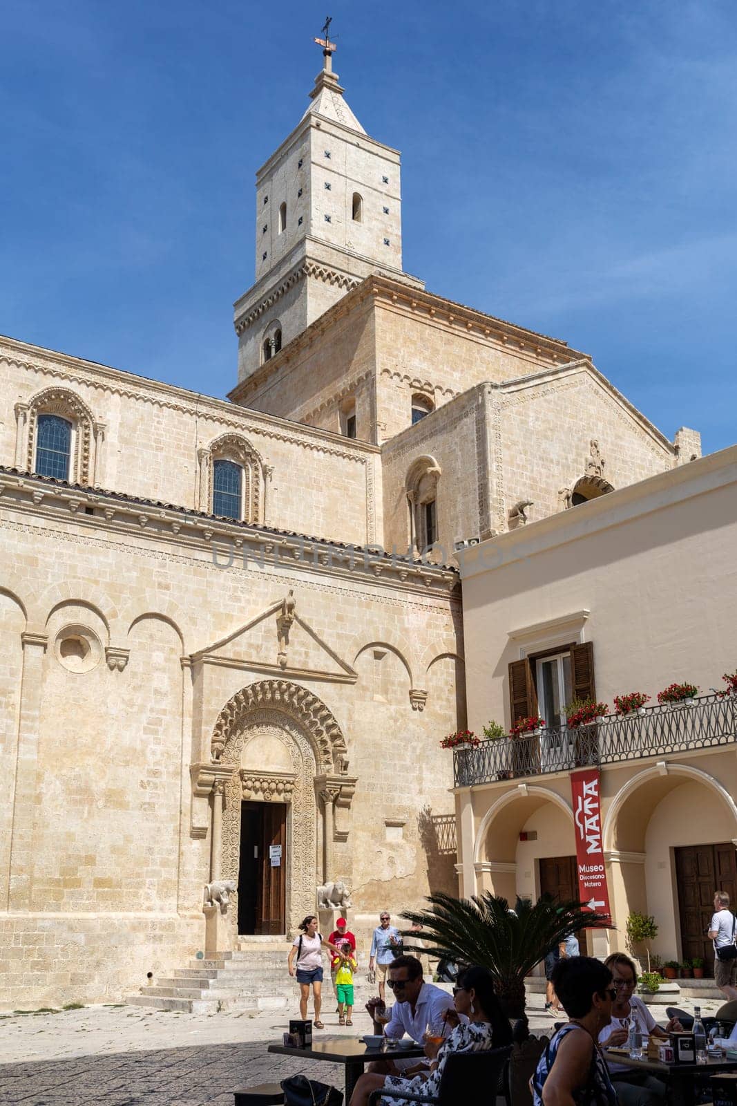 Matera, Italy - September 15, 2019: Cathedral church on Piazza Duomo in historical centre Sasso Caveoso of old ancient town of Matera, European Capital of Culture for 2019, UNESCO World Heritage.
