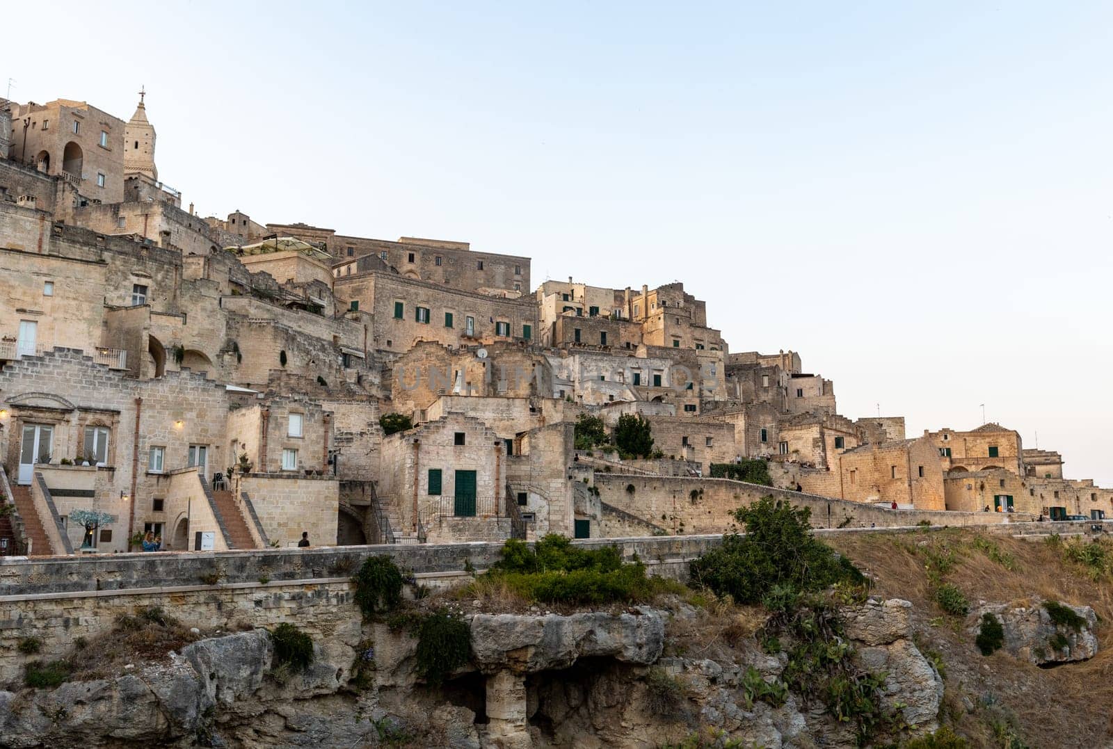 Matera, Italy - September 17, 2019: View of the Sassi di Matera a historic district in the city of Matera, well-known for their ancient cave dwellings. Basilicata. Italy