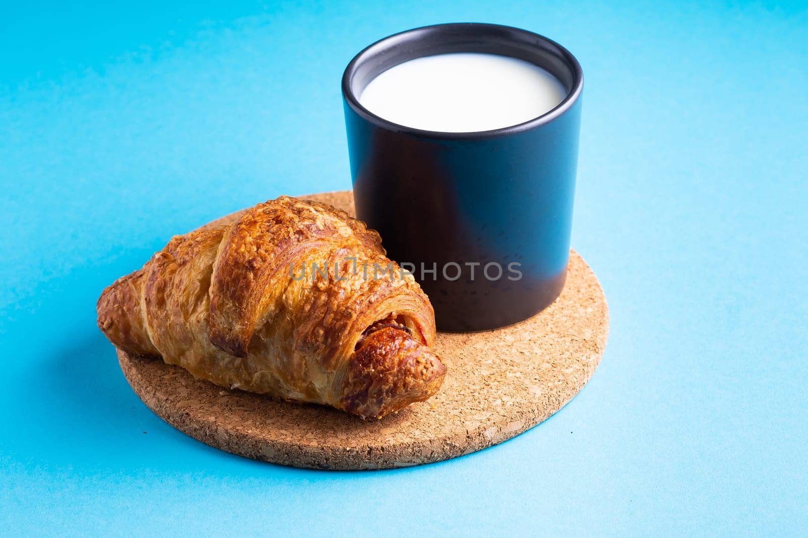 Wheat bread breakfast and milk in a morning, croissant, plate