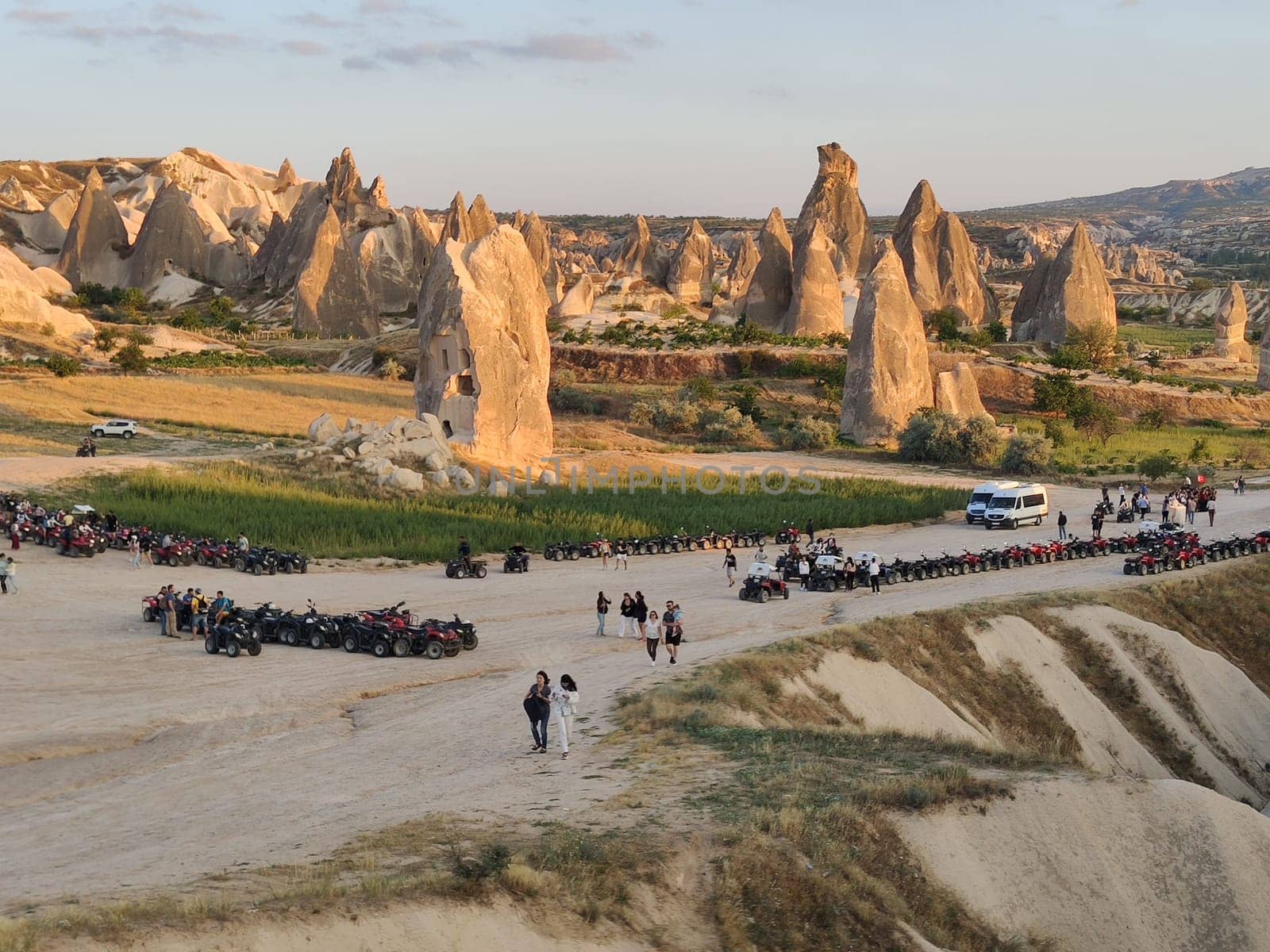 Quads and group of tourists near Cappadocia Fairy Chimneys
