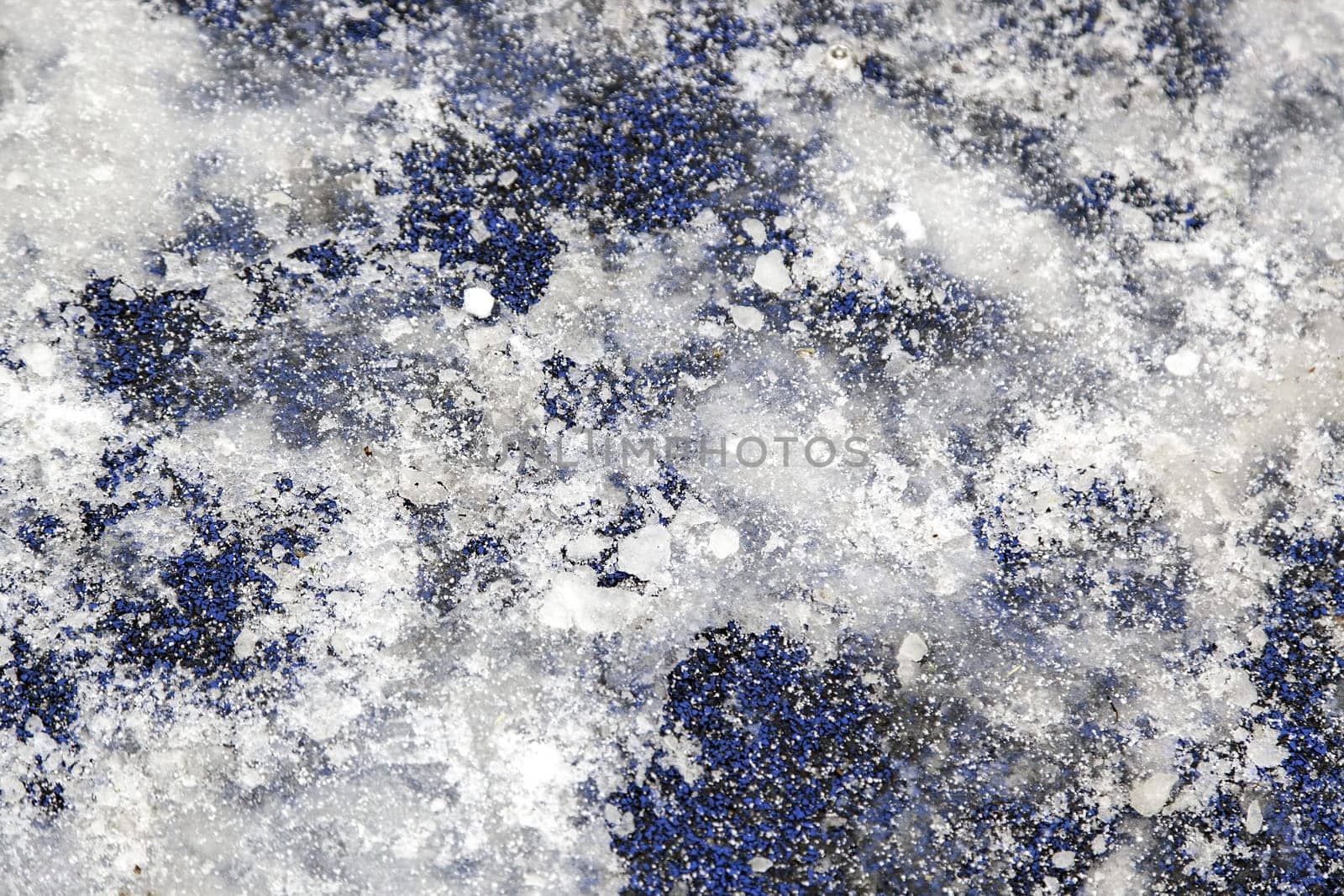 Detail of snowy and frozen ground in the city