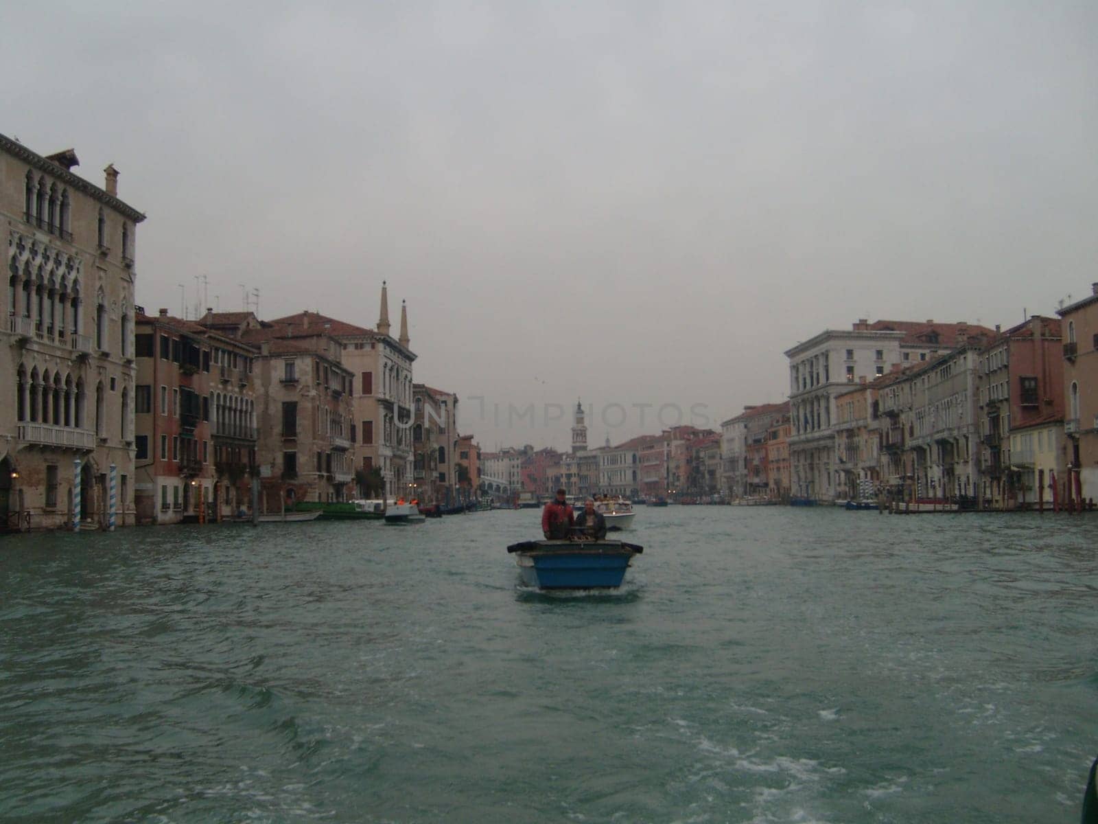Venice, Italy, July 22, 2007. Venetian streets with graceful building facades. Grand Canal. Along the canal are Gothic and Renaissance palaces. Sights of Italy. Tourism business