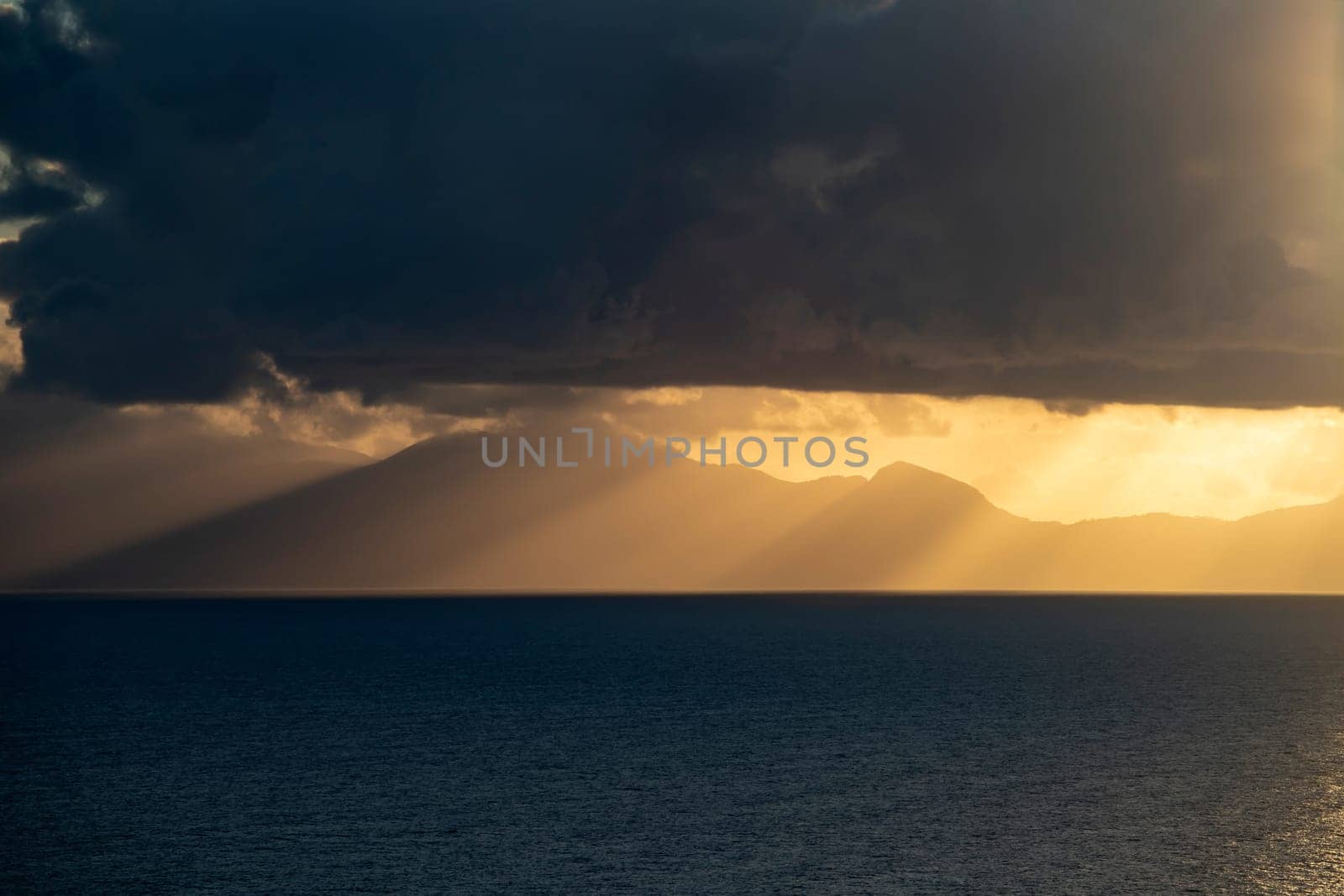 View from Procida island - magic sunrise with dramatic clouds.