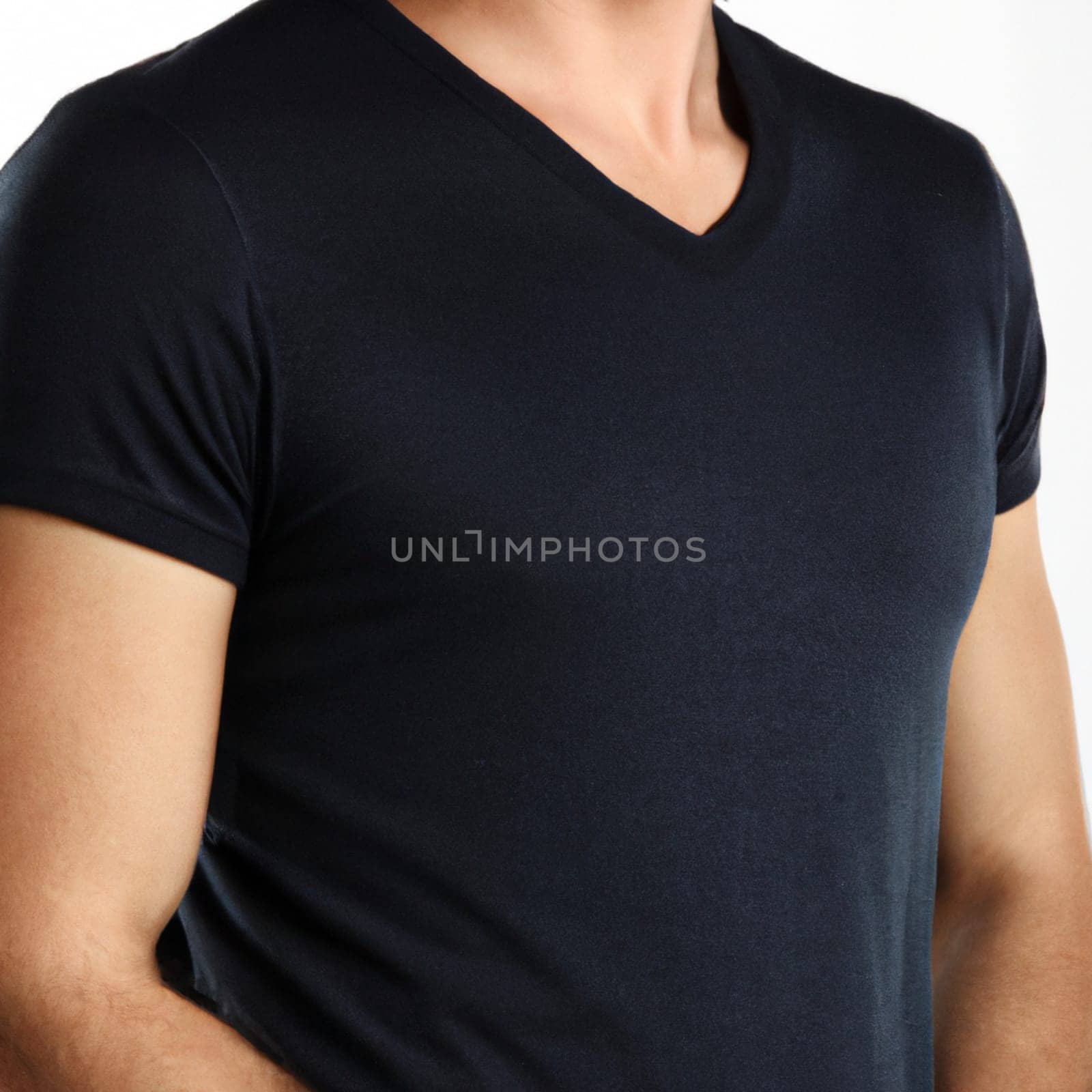 Black t-shirt template of man waring blank classic shirt. Torso of a slender adult man in a black t-shirt. copyspace. Clothing advertisement. Layout for inserting an inscription
