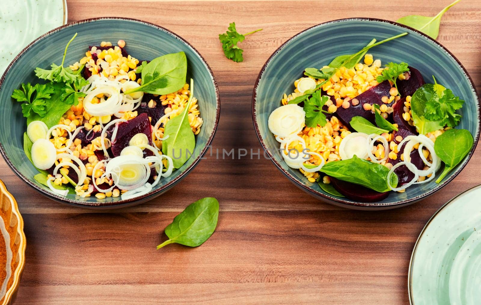 Salad with beets, red lentils, onions and herbs. Clean eating.