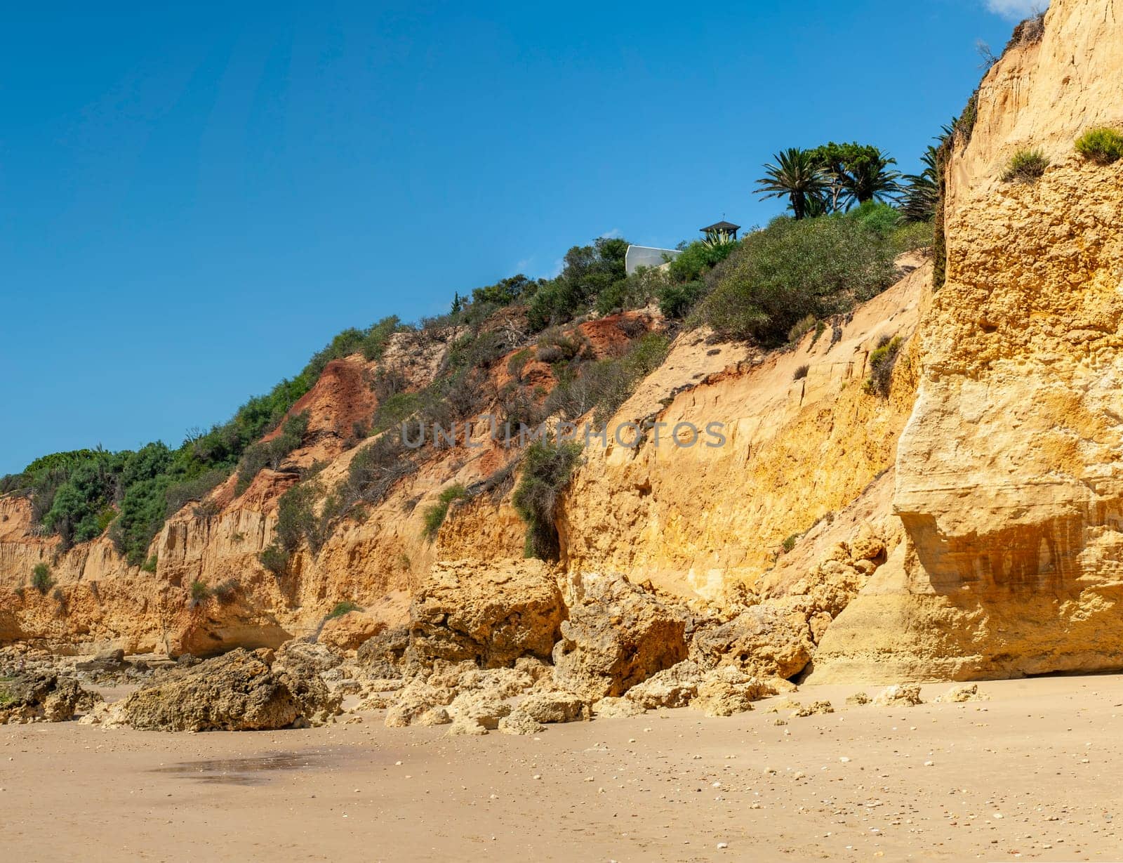 Maria Luisa beach with rock formation in Albufeira, Algarve, Portugal..