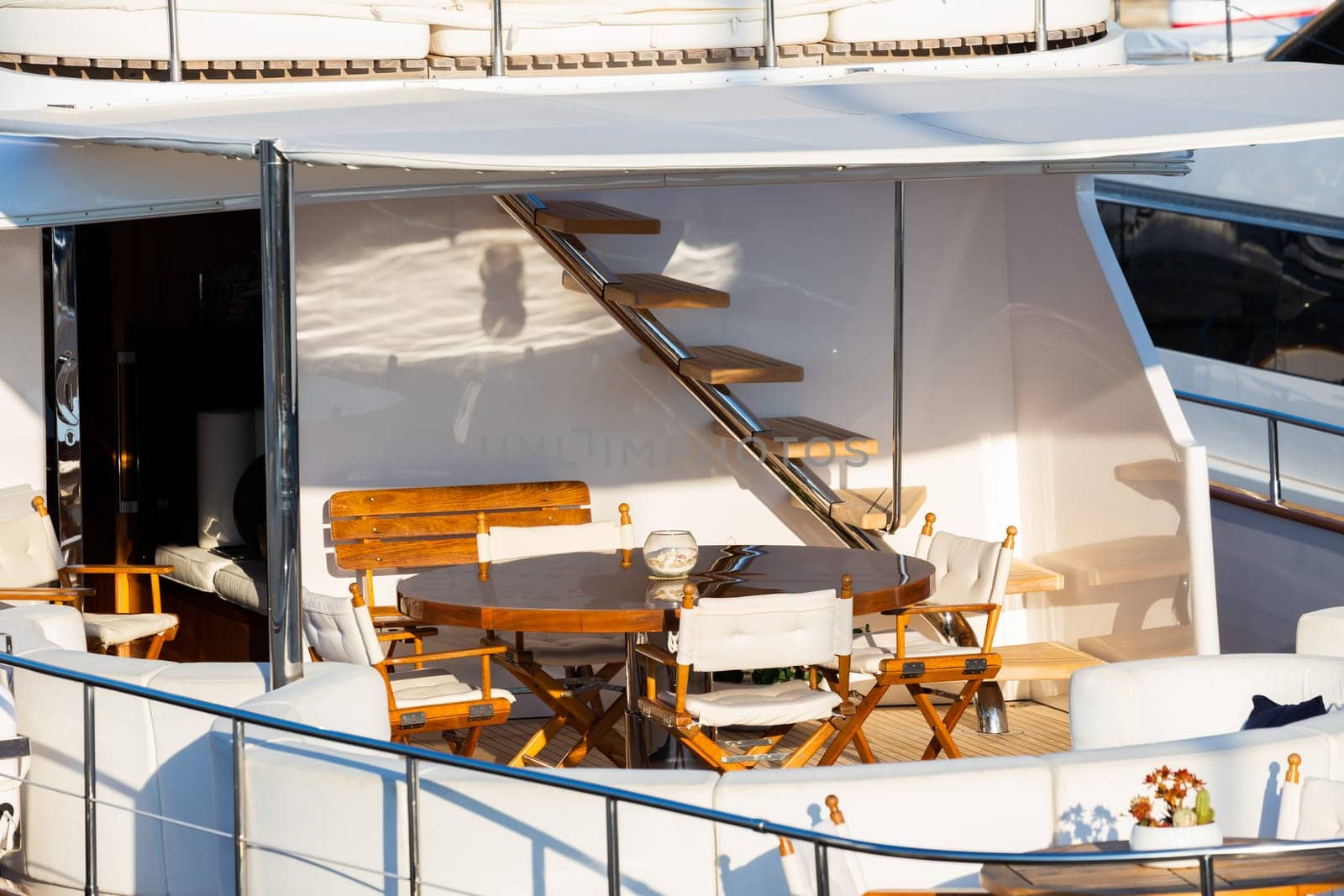 Luxury yacht. Comfortable expensive wooden design and furniture for holiday recreation tourism or travel and wealth concept