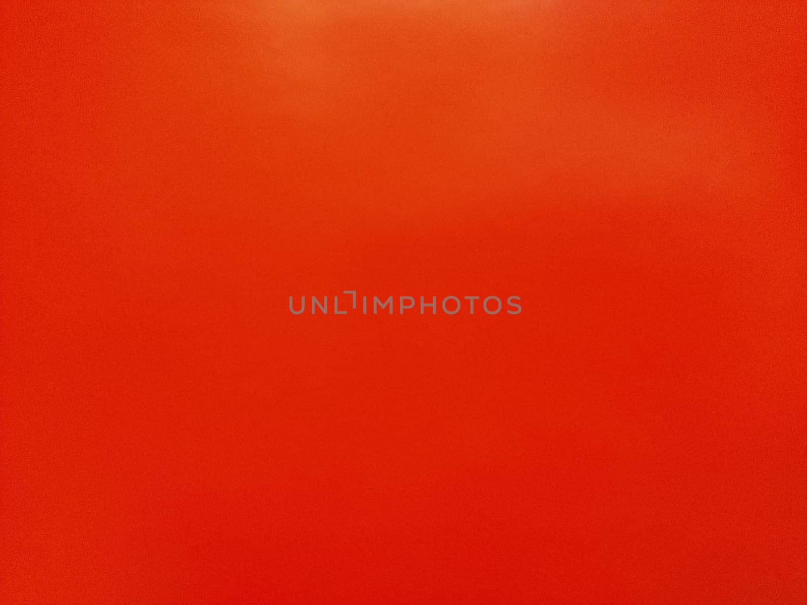 red - orange background. Beautiful bright color. Gradient and highlights. Sunny shades