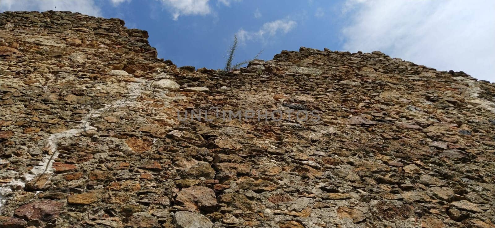 The walls of the old tower. Stone masonry that has stood in the open air for centuries. Sights of Serbia. Kula