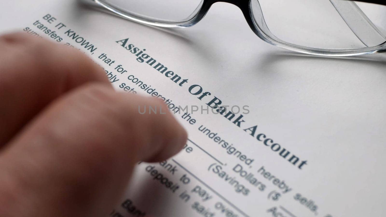 Finger tapping on assignment of bank account