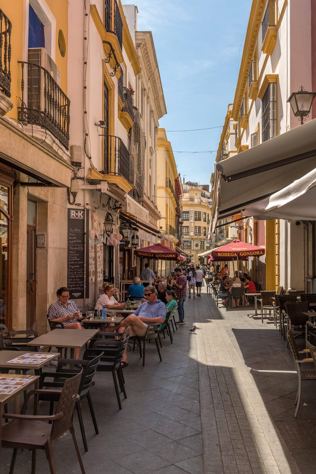 small street in the old town of Seville, Andalusia, Spain