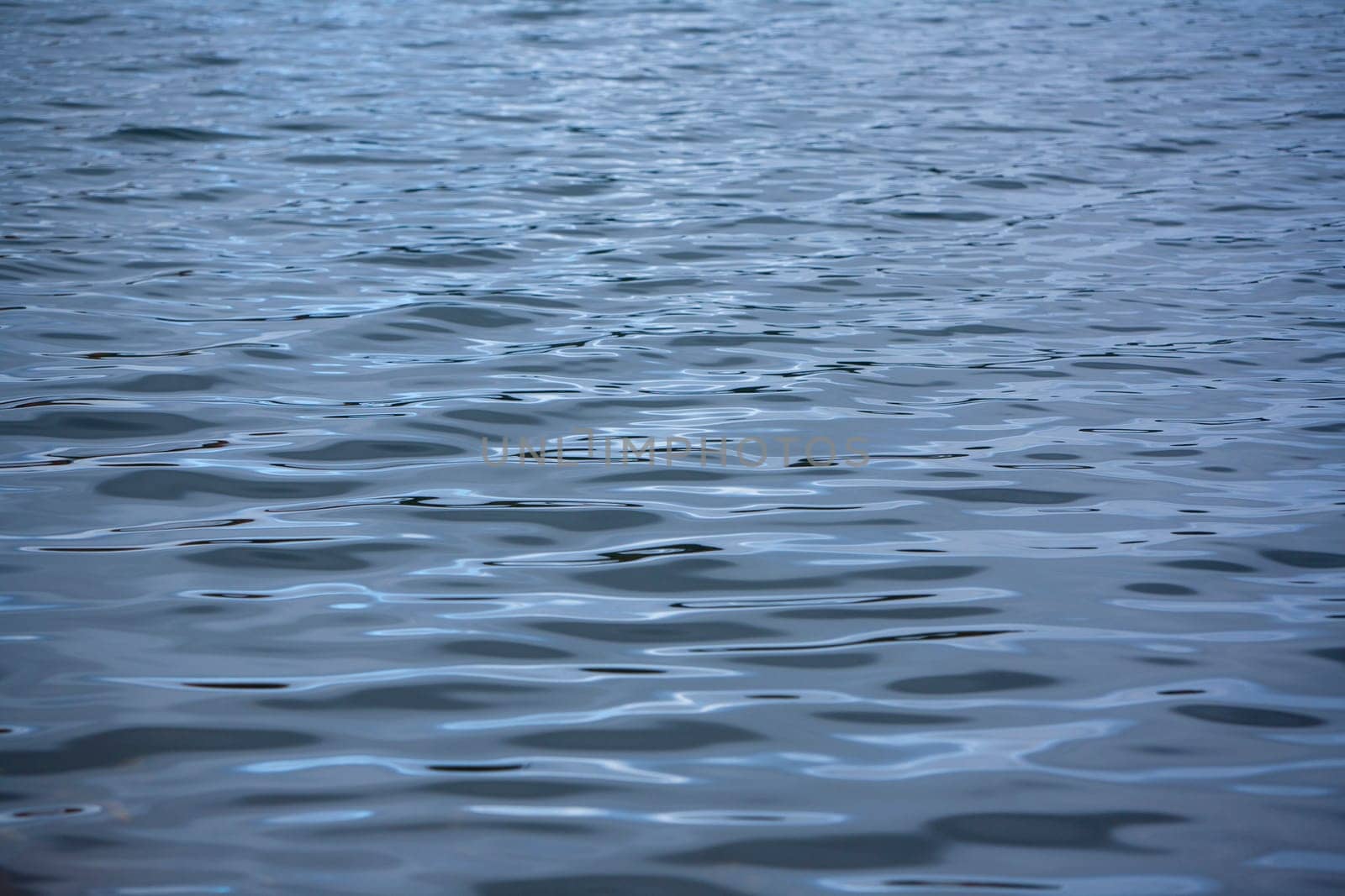 Water Reflections on Colby Lake in Saranac Lake, New York.