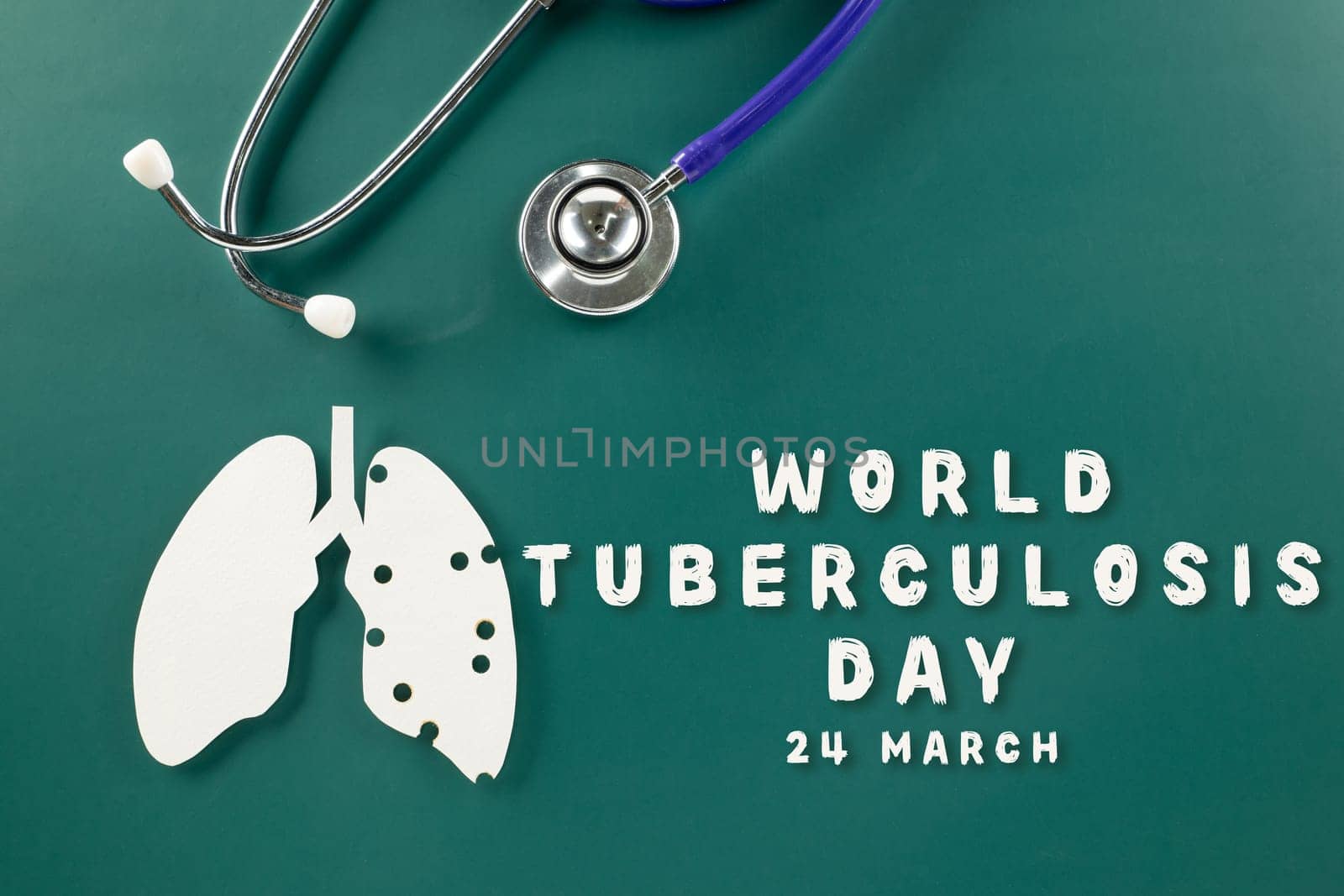 World TB Day. Lungs paper cutting symbol and medical stethoscope on green background, copy space, lung cancer awareness, concept of world tuberculosis day, banner background, respiratory diseases