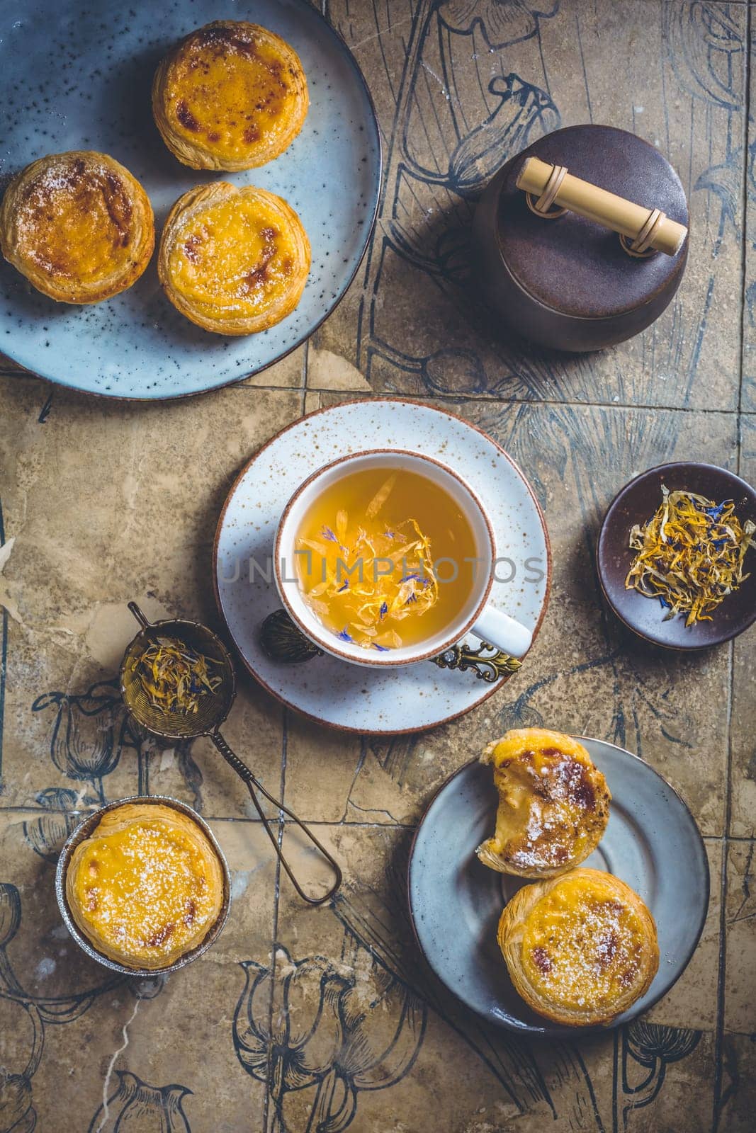 Pastel de nata with cup of herbal tea, Portugal sweet egg and pudding pastry