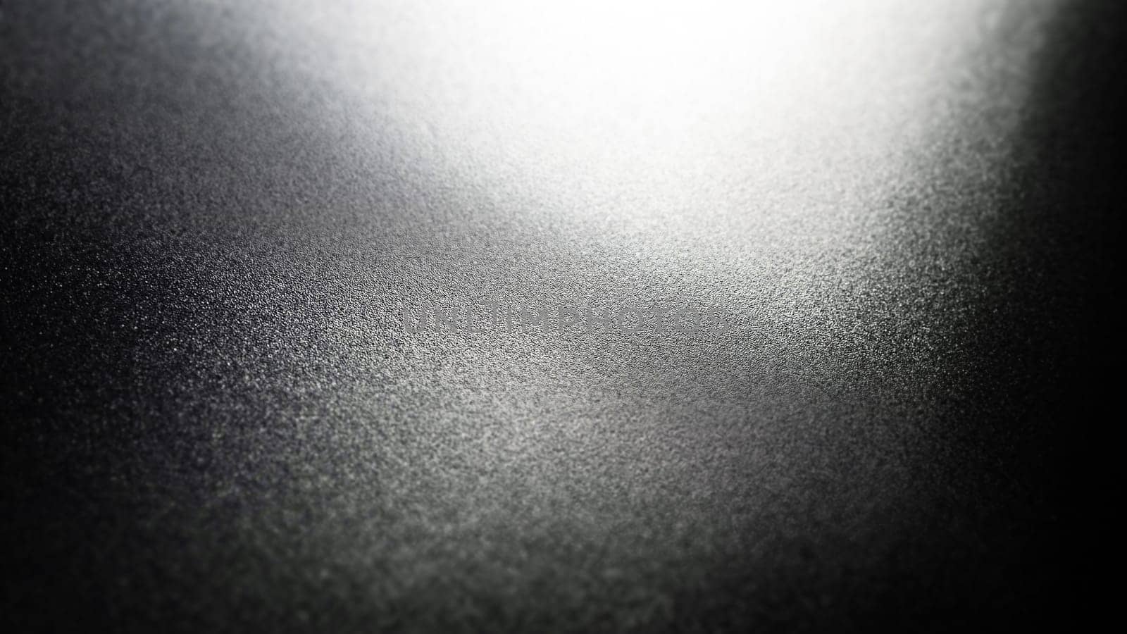 White bokeh and beam on a black background. Blurred glow from above on a dark surface. Night or space theme. Bokeh for the holiday. Abstract background. Glare, ray and light shine from above