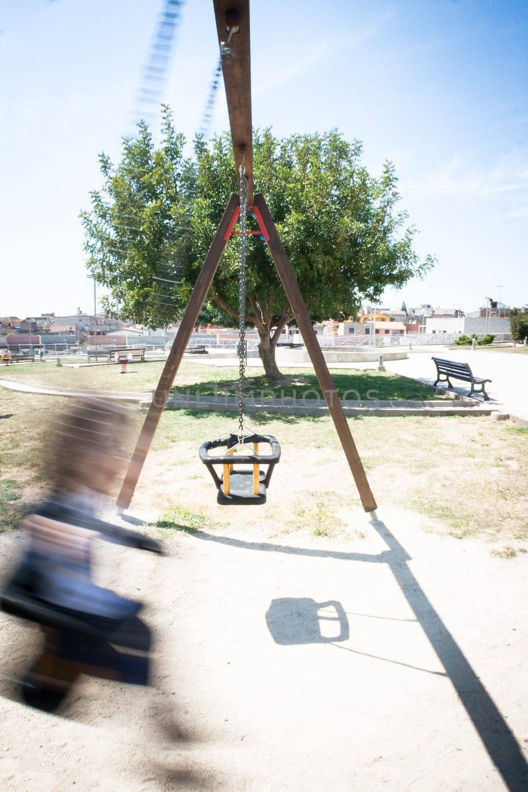 baby swing movement. Image of a child on a seesaw