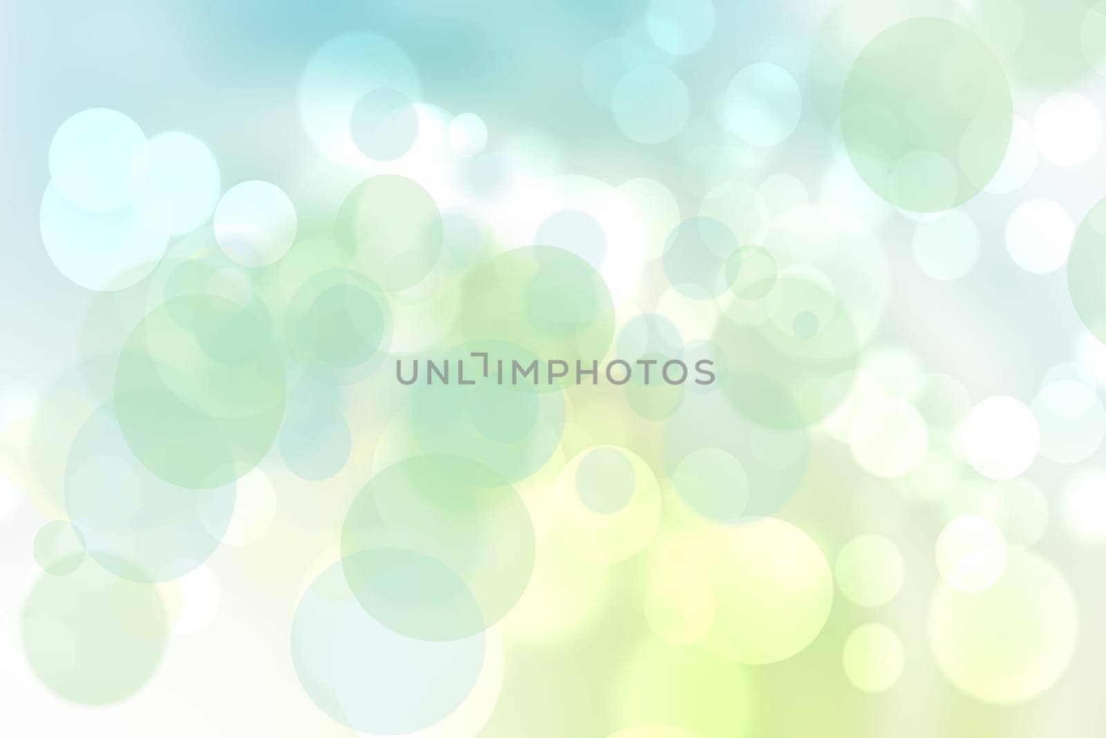 Abstract blurred vivid spring summer delicate yellow blue green bokeh background texture with bright soft color circles and bokeh lights. Card concept. Beautiful backdrop illustration.