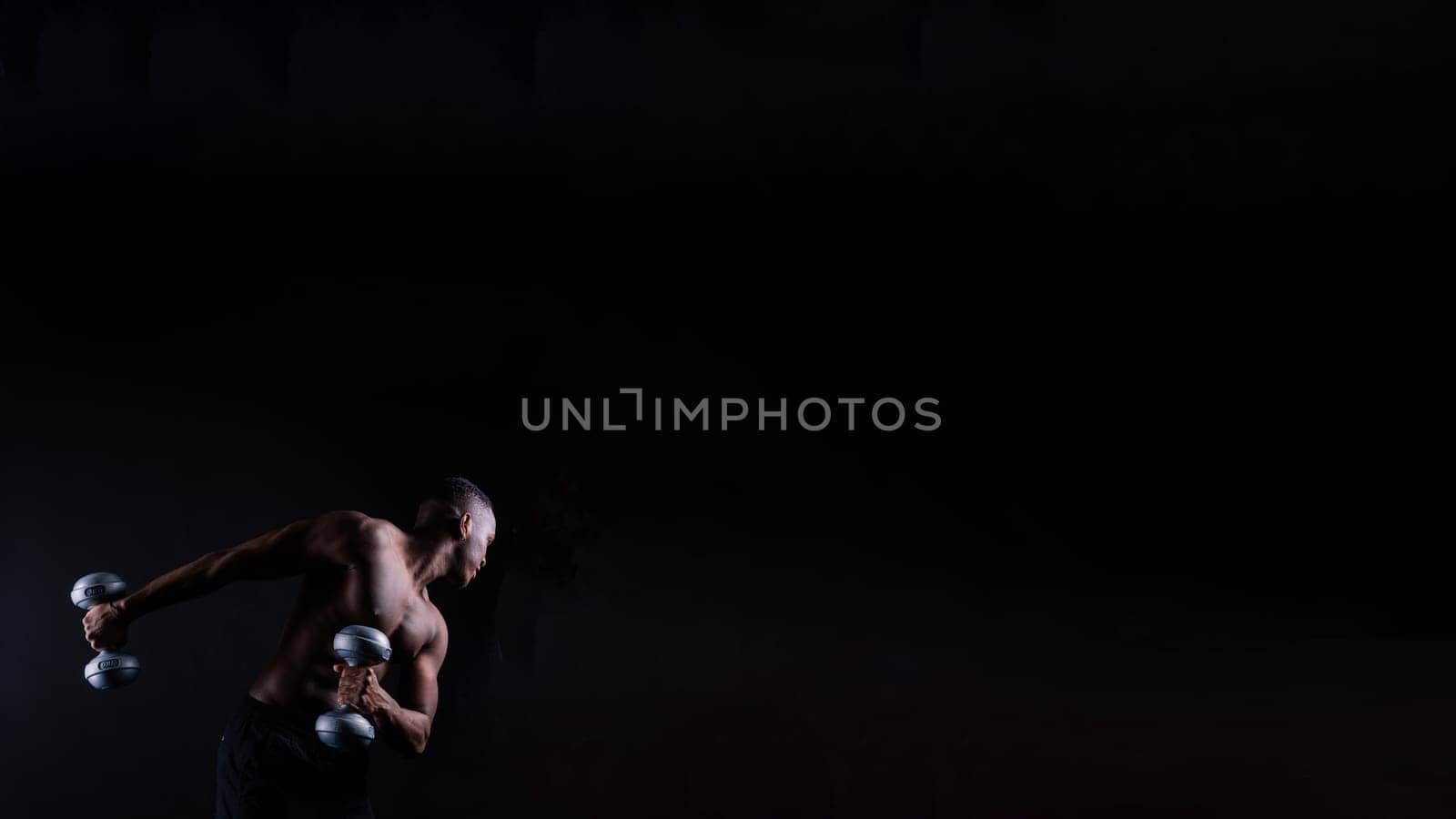 Muscular black african man with muscles abs abdominal, exercise determination and success