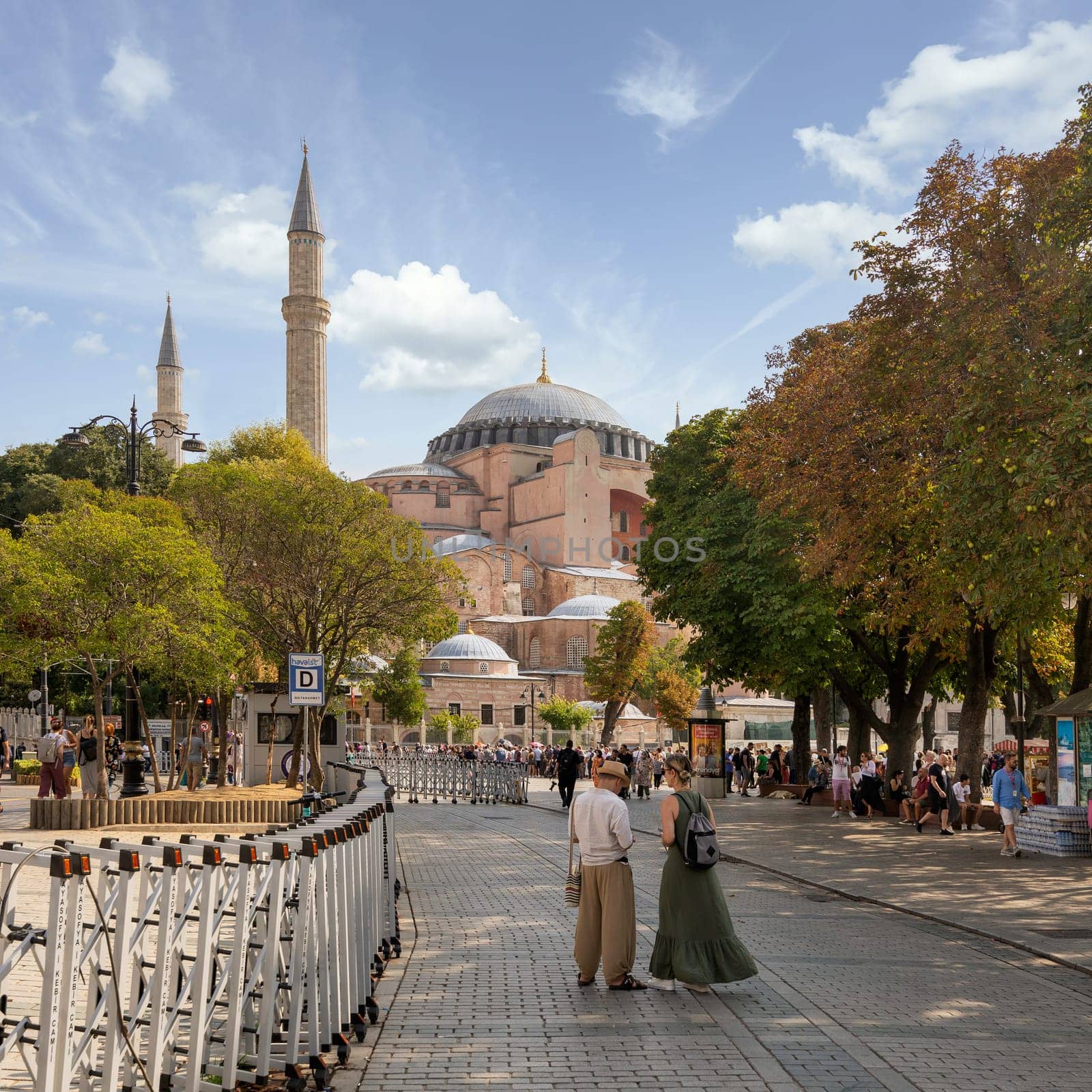 Istanbul, Turkey - August 30 2022: Tourists and locals near to Hagia Sophia Mosque, or Ayasofya Camii, formerly a Greek Orthodox church, during Victory Day holiday