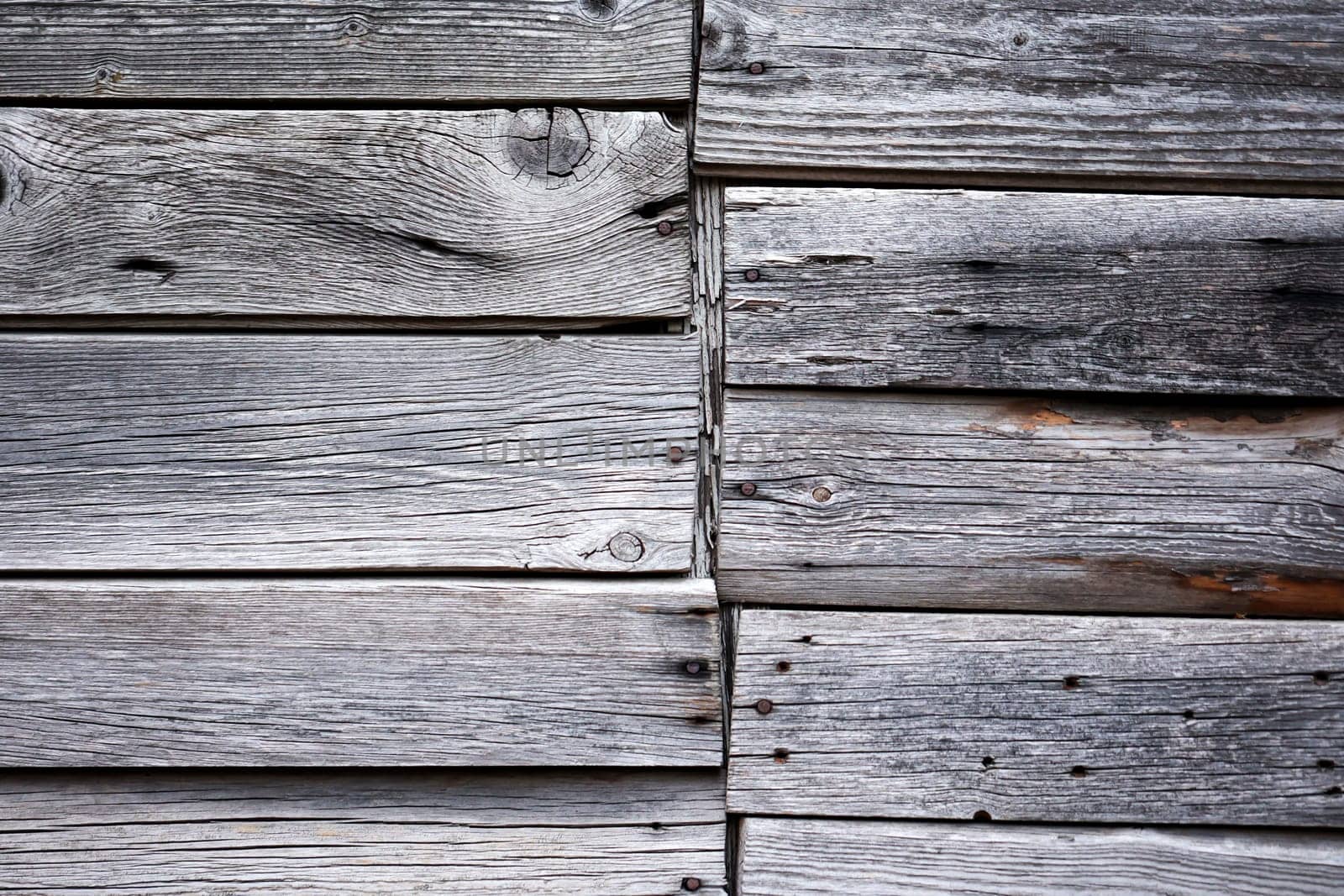 Wooden boards that lie next to each other. A wood texture made of several wooden boards.