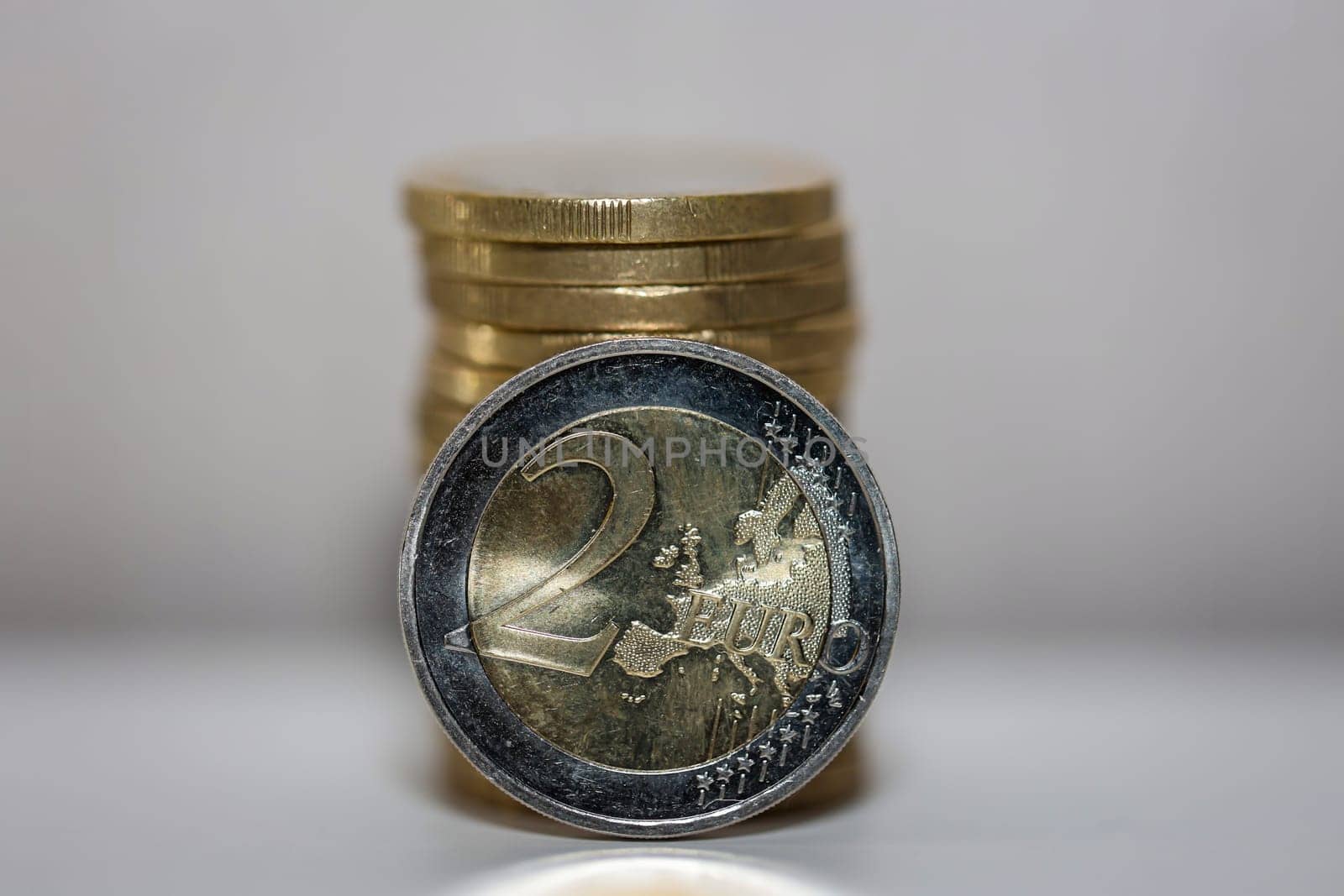Two euro coins, close-up of a coin with the value of 2 euros.