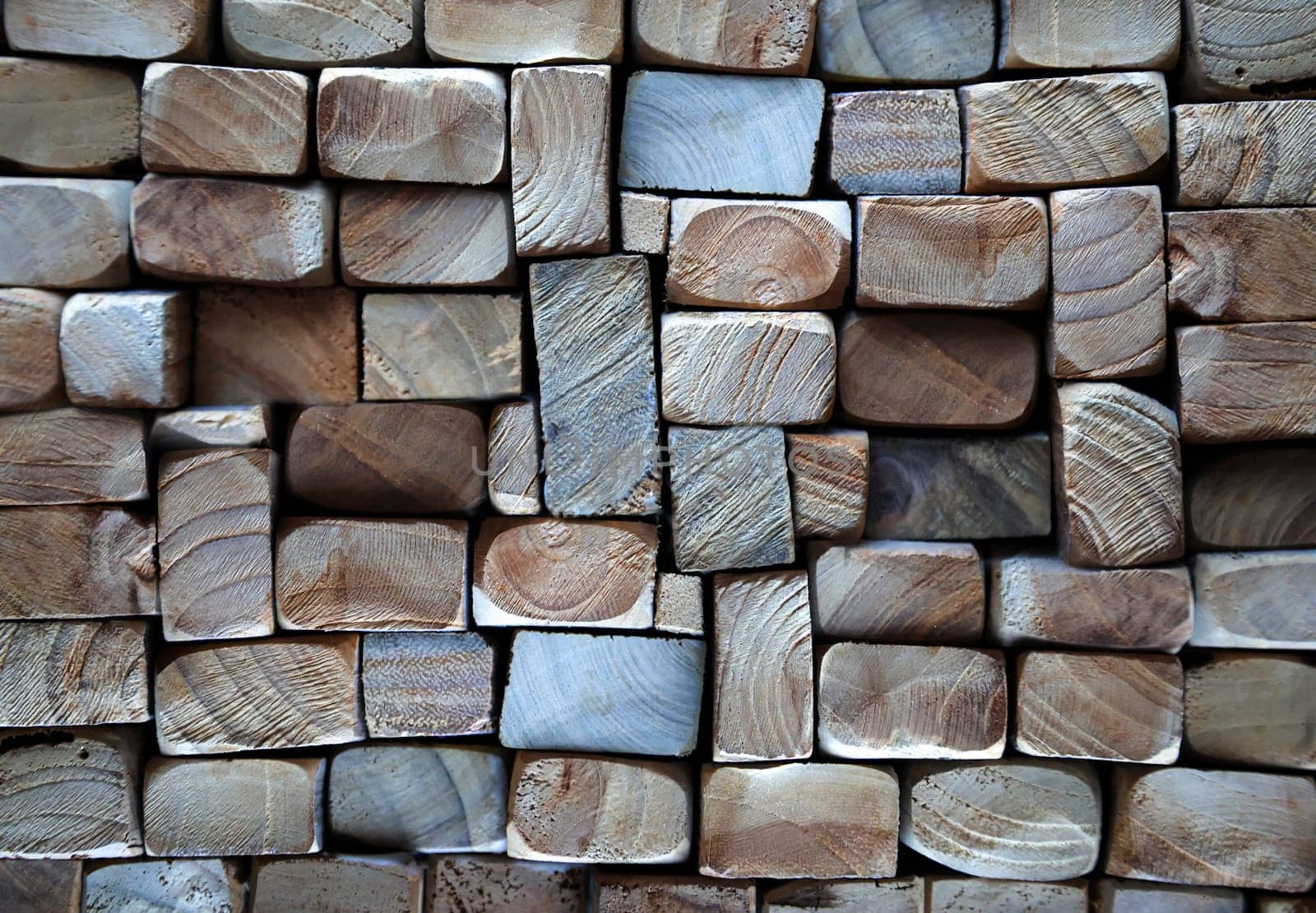 A texture of wood. Many stacked wooden slats from the front side.
