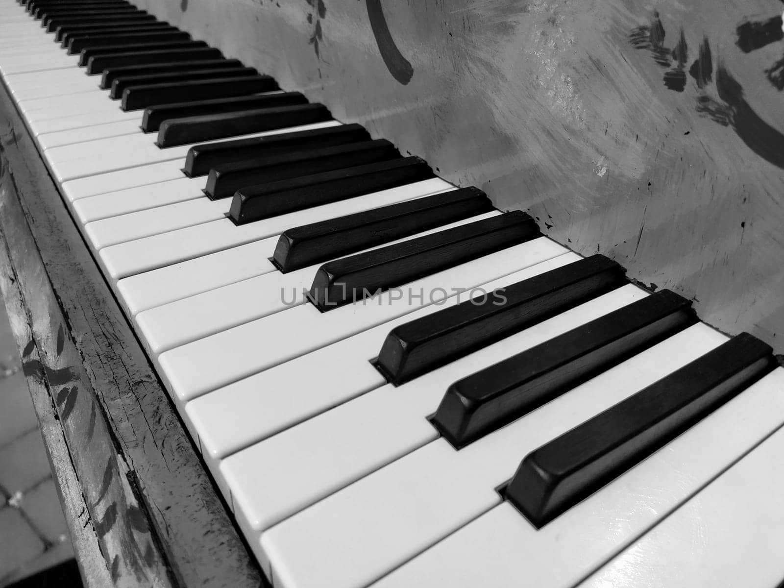 A piano or piano is a stringed percussion and keyboard musical instrument. An octave is a musical interval in which the ratio of frequencies between sounds is one to two. Black and white monochrome