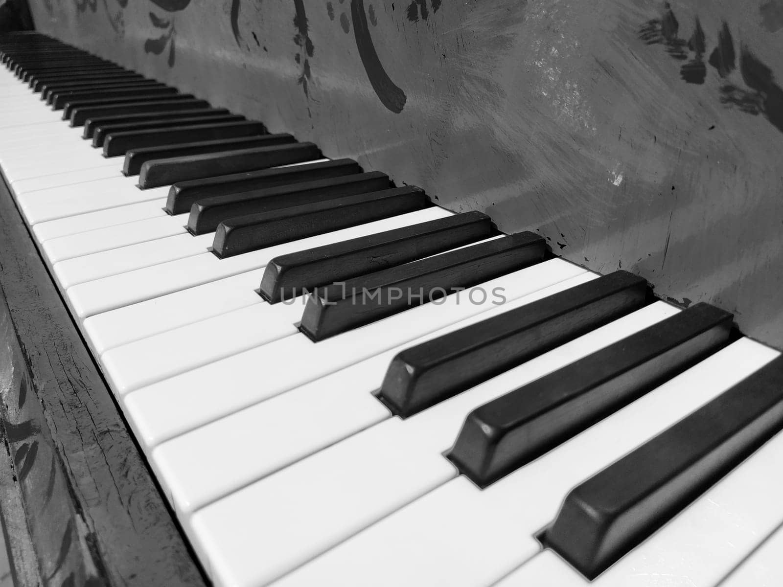 A piano or piano is a stringed percussion and keyboard musical instrument. An octave is a musical interval in which the ratio of frequencies between sounds is one to two. Black and white monochrome
