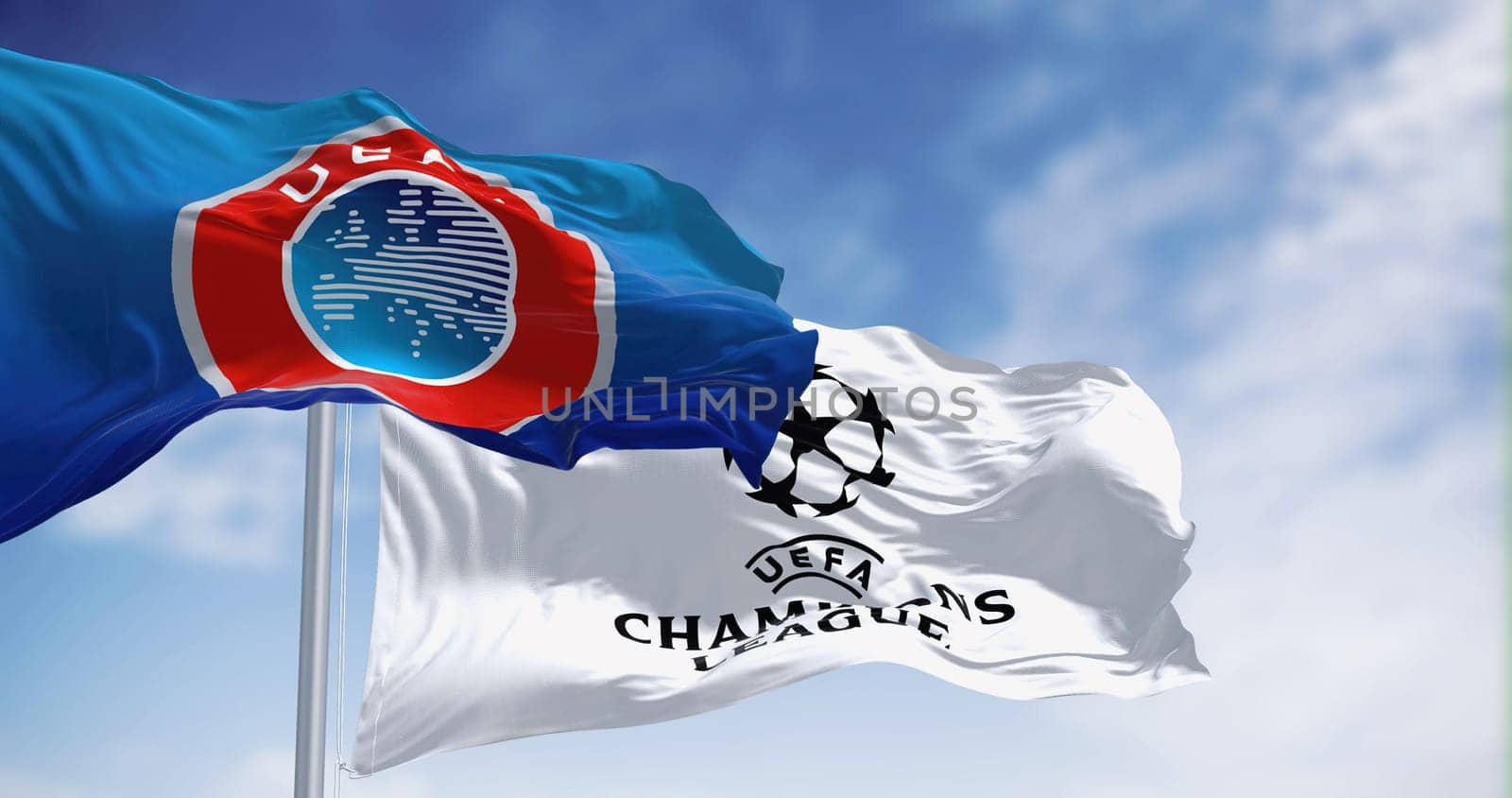 Istanbul TR, Jan 2023: UEFA and UEFA Champions league flag waving together. European football competition. Rippled fabric. Illustrative editorial 3d illustration render