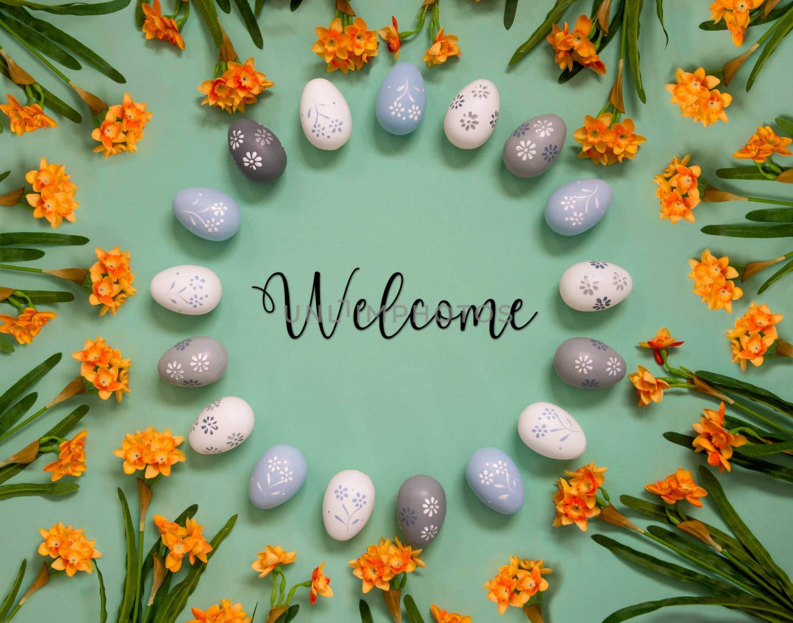 Flat Lay With English Text Welcome. Easter Egg Decoration With Orange Spring Flowers. Light Green Paper Background.