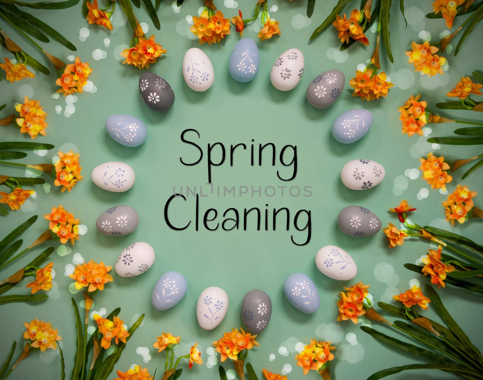 Flat Lay With English Text Spring Cleaning. Easter Egg Decoration With Orange Spring Flowers. Light Green Paper Background With Bright And Shiny Light Effect.