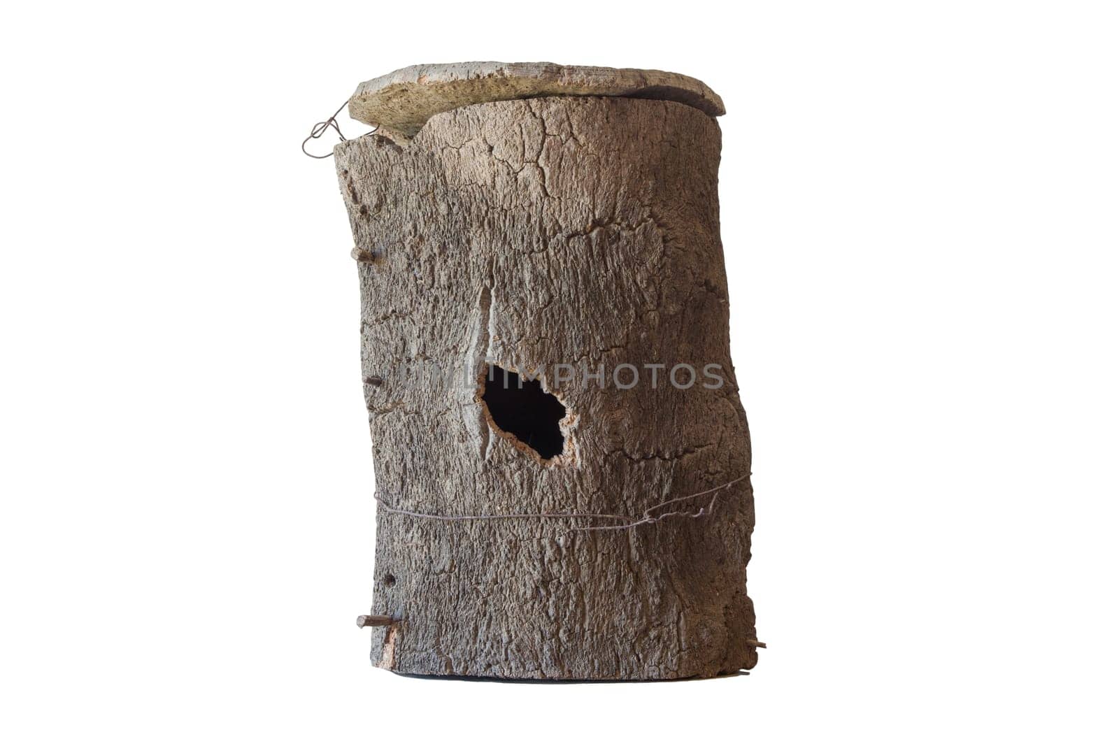 Traditional hive made of cork. Isolated over white background