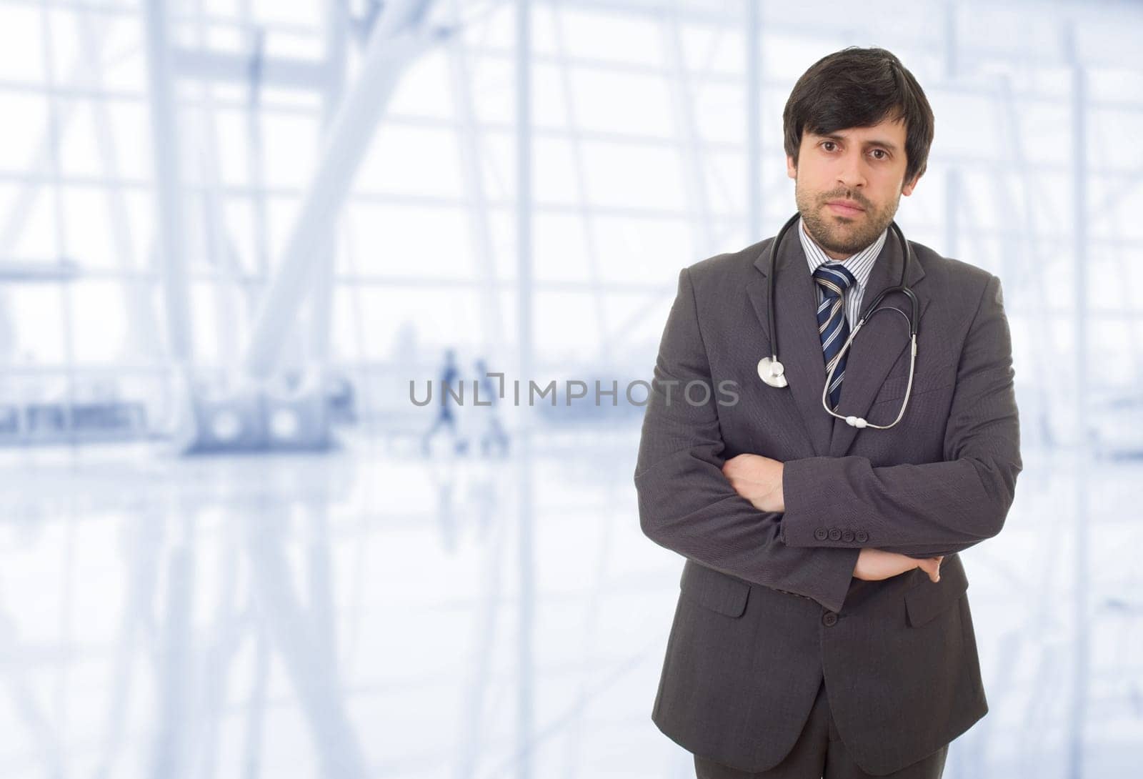 happy male doctor at the hospital