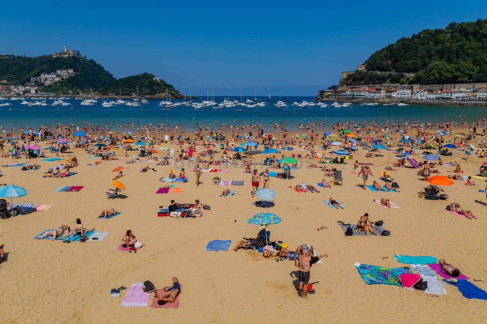 San Sebastian, Basque Country, Spain: August, 20, 2022: Landscape of La Concha beach in the city of San Sebastian, in the Spanish Basque Country