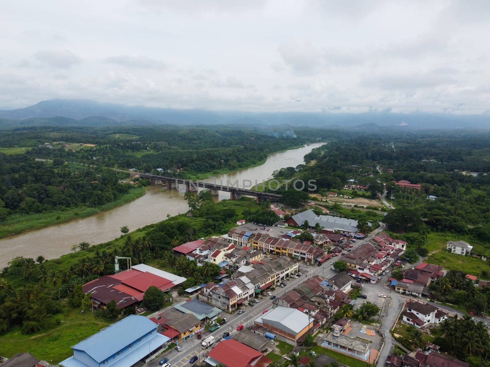 Kuala Kangsar, Perak, Malaysia - May 04 2022: Aerial view Kuala Kangsar Victoria railway Bridge and town