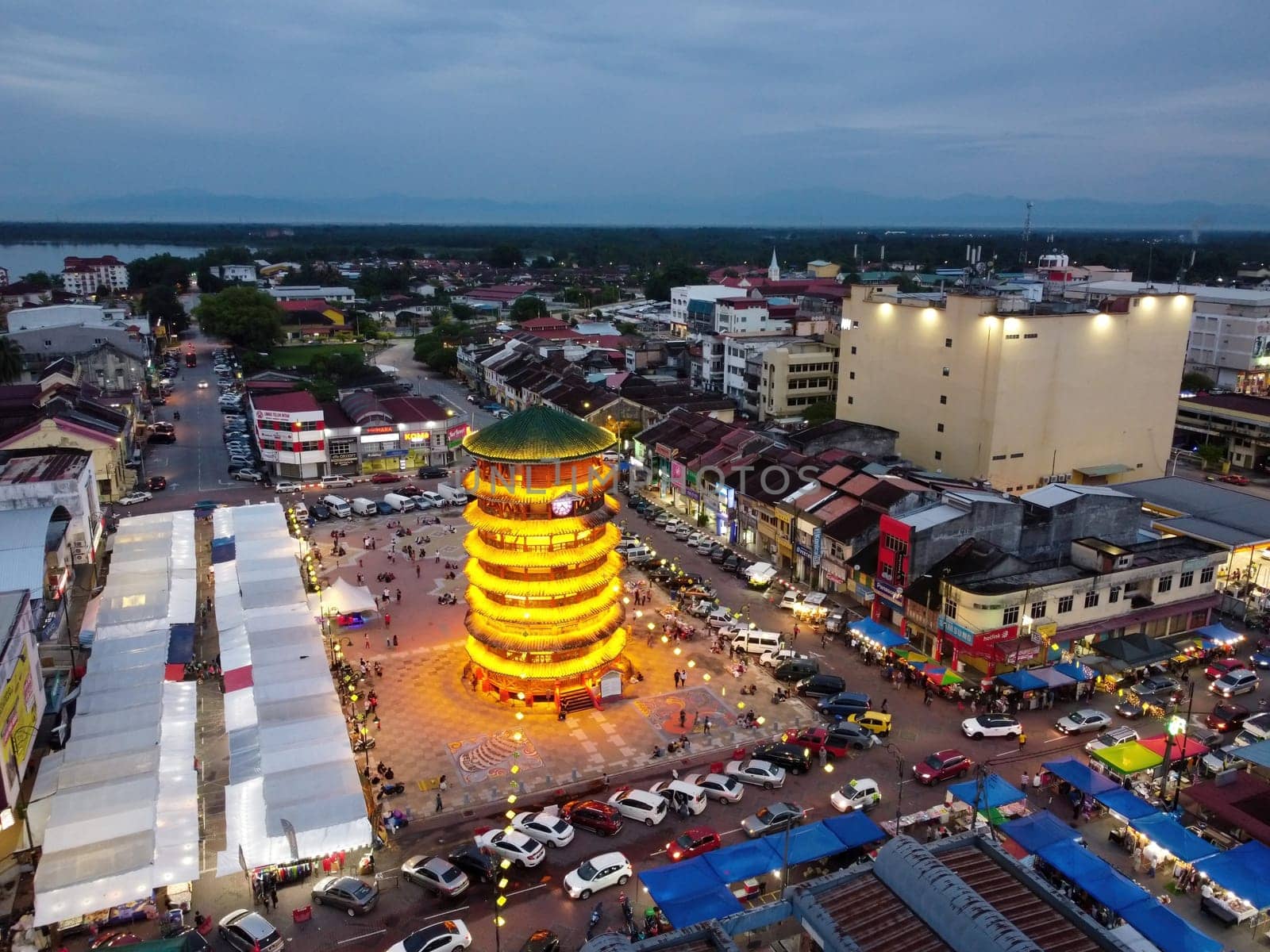 Teluk Intan, Perak, Malaysia - May 01 2022: Teluk Intan tower with beauty illuminated led light and town in blue hour