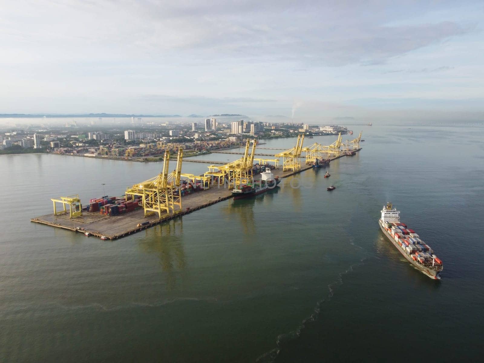 George Town, Penang, Malaysia - Jun 12 2022: Aerial view container ship and terminal port Butterworth