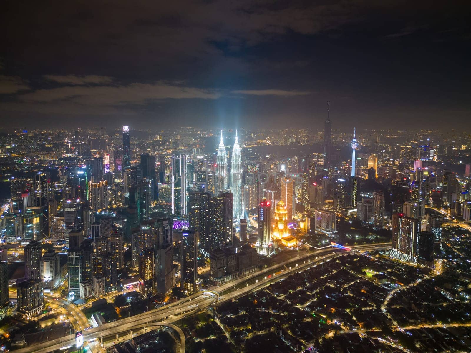 Bukit Bintang, Kuala Lumpur, Malaysia - Dec 04 2022: Aerial view Kampubng Baru and KL city in night
